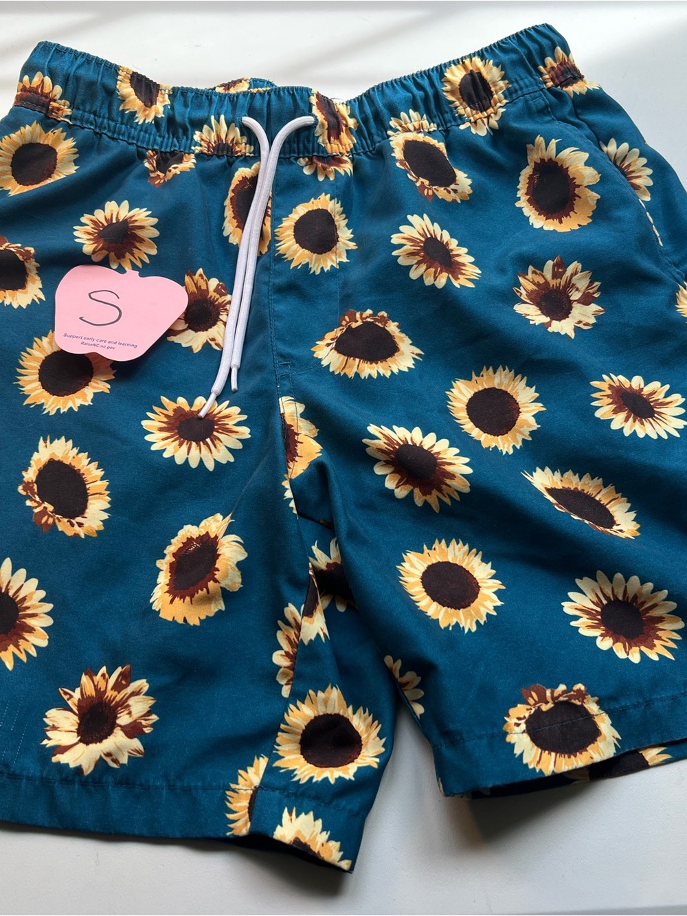 Empyre Teal Swim Shorts with Sunflower Print